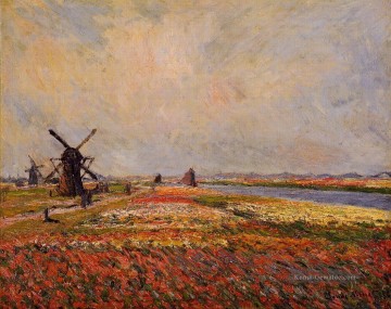 Felder von Blumen und Windmühlen in der Nähe von Leiden Claude Monet Ölgemälde